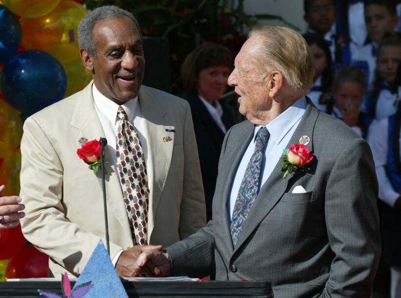 Bill Cosby and Art Linkletter at the podium as they were announced as the Grand Marshalls to lead the 2003 Rose Parade.