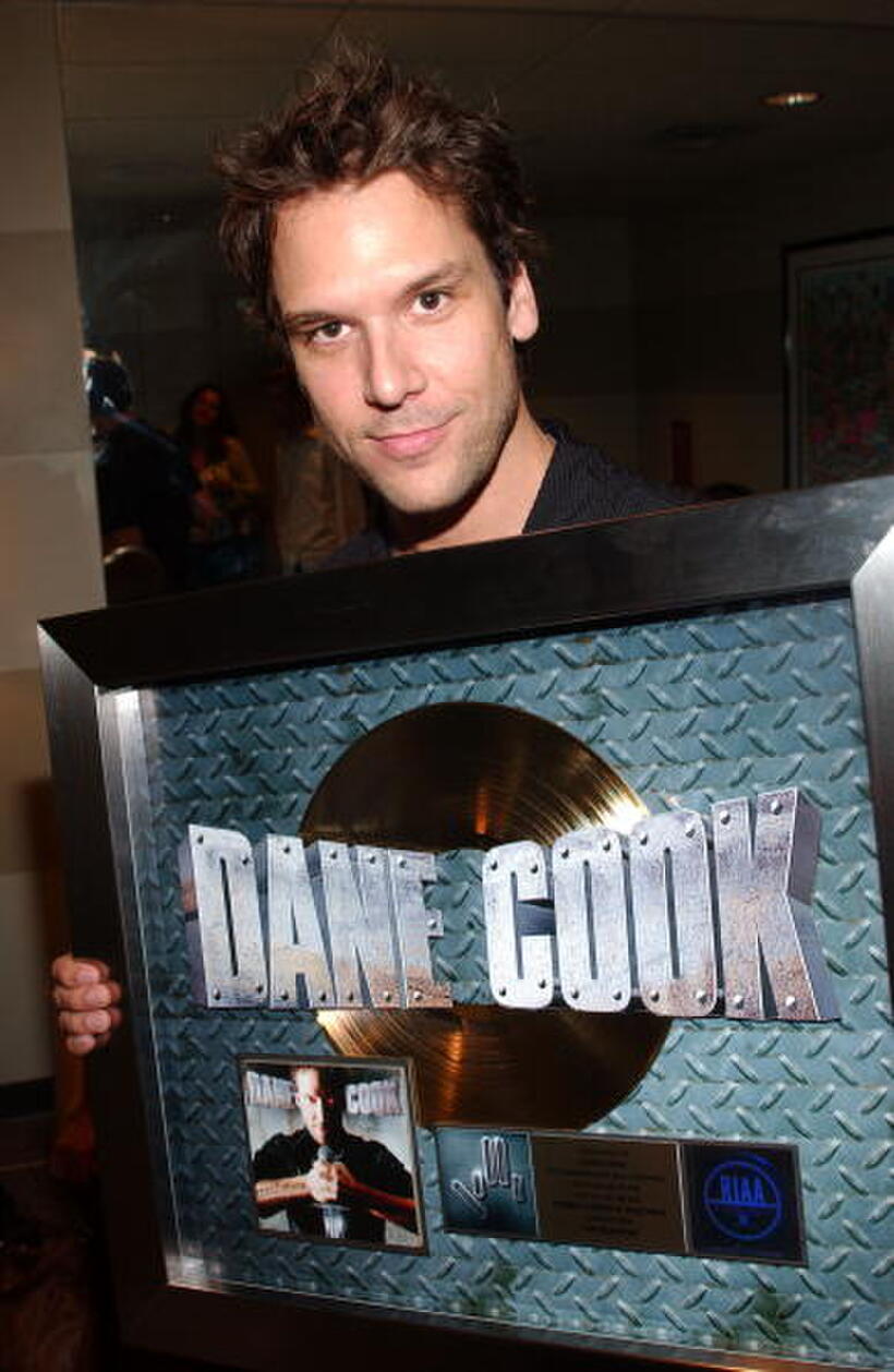 RIAA & Comedy Central present Dane Cook with gold record. 
