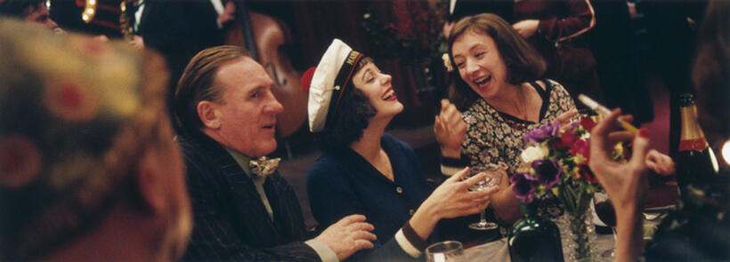 Louis Leplee (Gerard Depardieu), Edith Piaf (Marion Cotillard) and Momone (Sylvie Testud) in "La Vie en Rose."