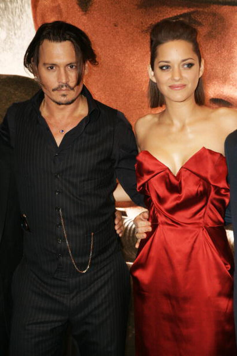 Johnny Depp and Marion Cotillard at the European premiere of "Public Enemies."