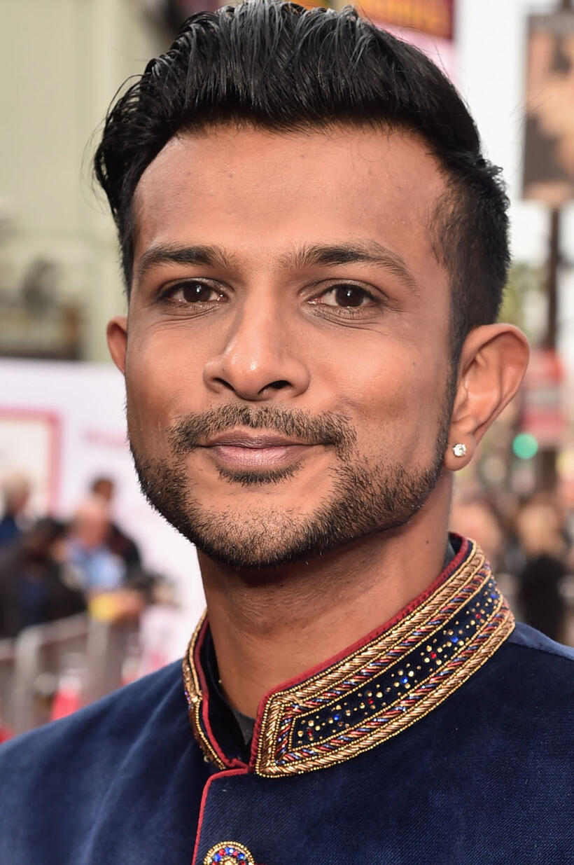 Utkarsh Ambudkar at the premiere of "Barbershop The Next Cut" in Hollywood.