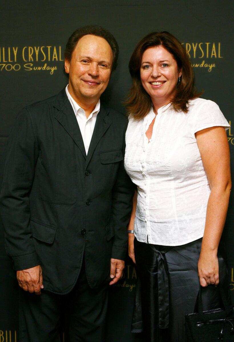 Billy Crystal and Gina Riley at the opening of the Dominique Cohen Flagship Jewelry Store.