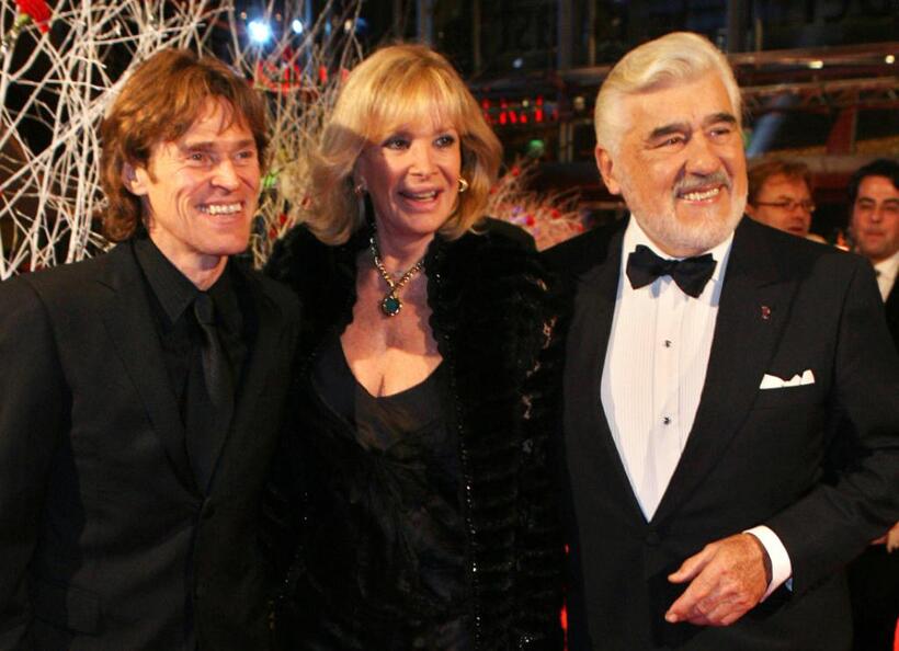 Willem Dafoe, German actor and jury member Mario Adorf and his wife Monique at the 57th Berlinale International Film Festival.