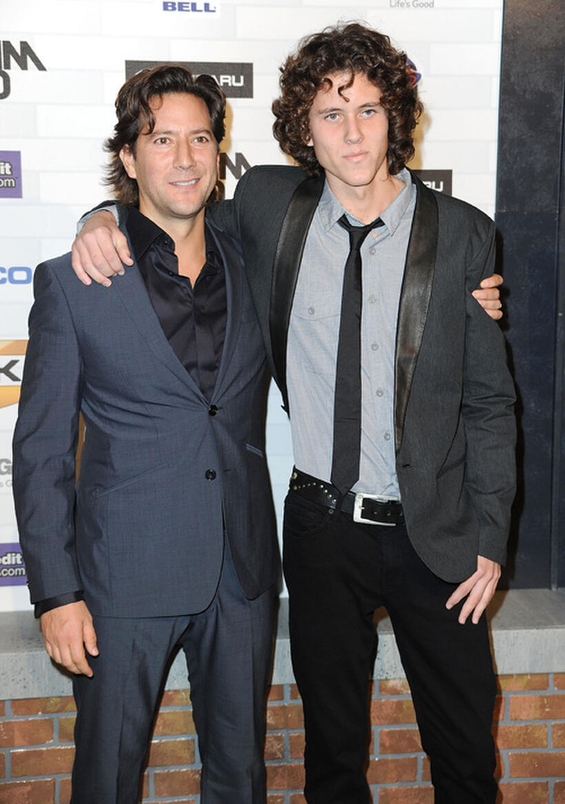 Henry Ian Cusick and Guest at the Spike TV's Scream 2010.
