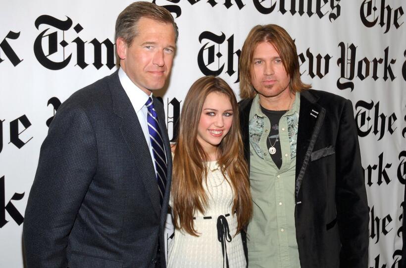 Brian Williams, Miley Cyrus and Billy Ray Cyrus at the 6th Annual New York Times Arts & Leisure Weekend.