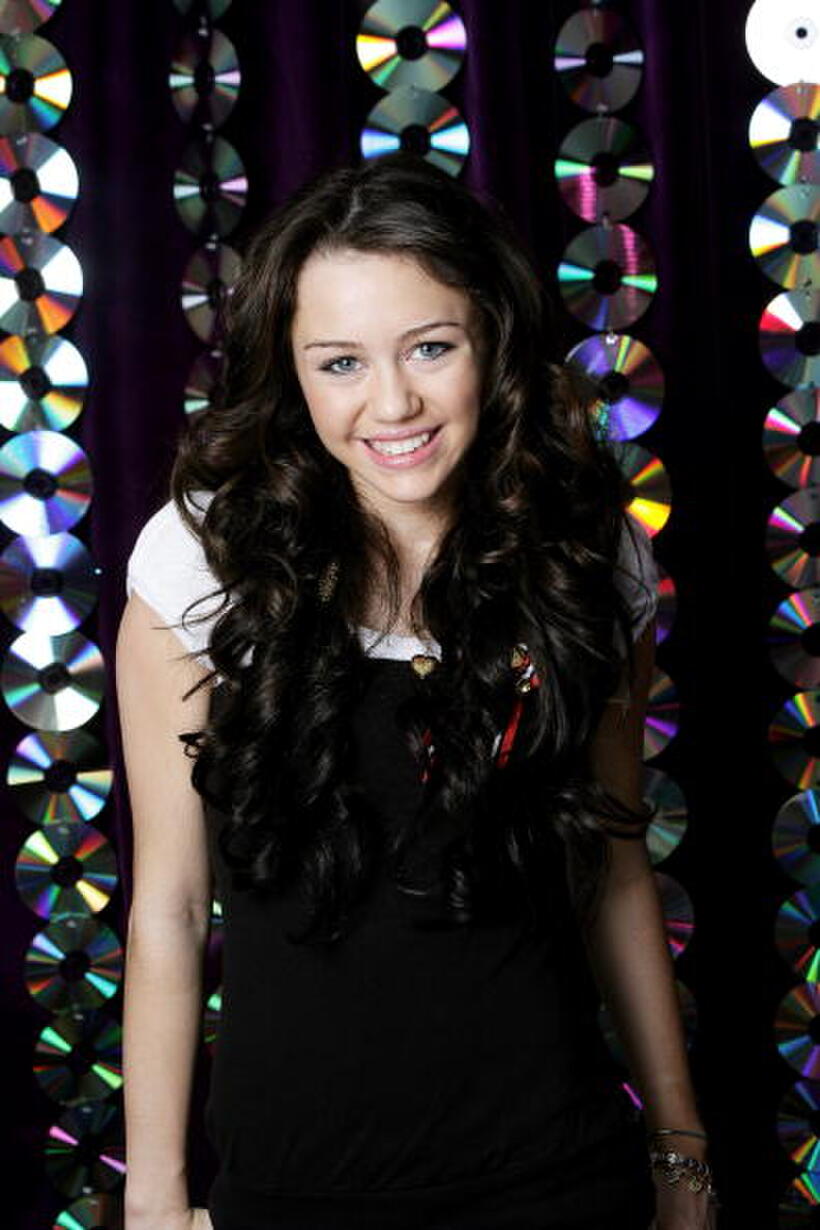 Miley Cyrus at a portrait session to promote DVD "Hannah Montana - Behind the Spotlight."