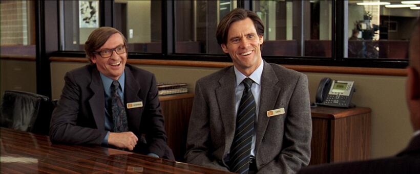 Rhys Darby as Norm and Jim Carrey as Carl in "Yes Man."