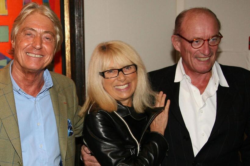 Mireille Darc, her husband and Pierre Cornette at the Alain Delon pre-launch cocktail party.