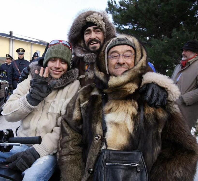 Valentino Rossi, Luciano Pavarotti and Lucio Dalla at the charity for disabled youth.