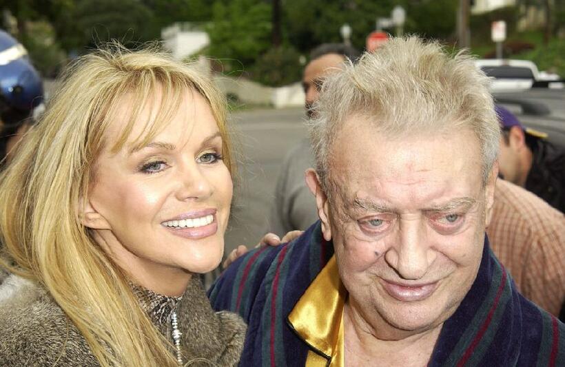 Rodney Dangerfield and wife Joan at the new jacuzzi 21 floors up to their Wilshire Corridor apartment for Valentine's Day Stunt.