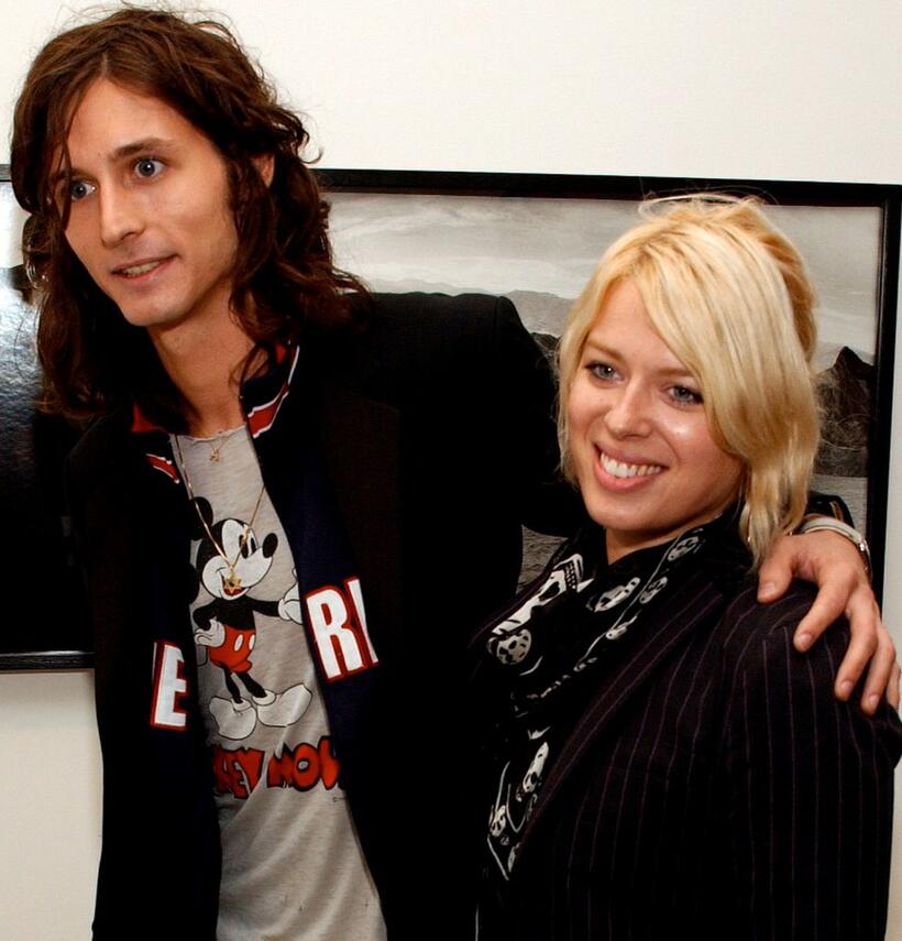Nick Valensi and Amanda de Cadenet at the opening of Anton Corbijn's photo exhibition.