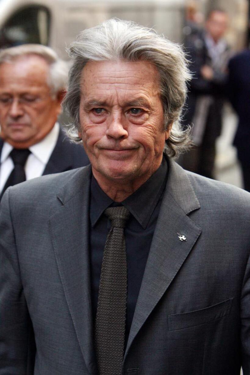 Alain Delon at the church after the funeral of French actor and filmmaker Jean-Claude Brialy.