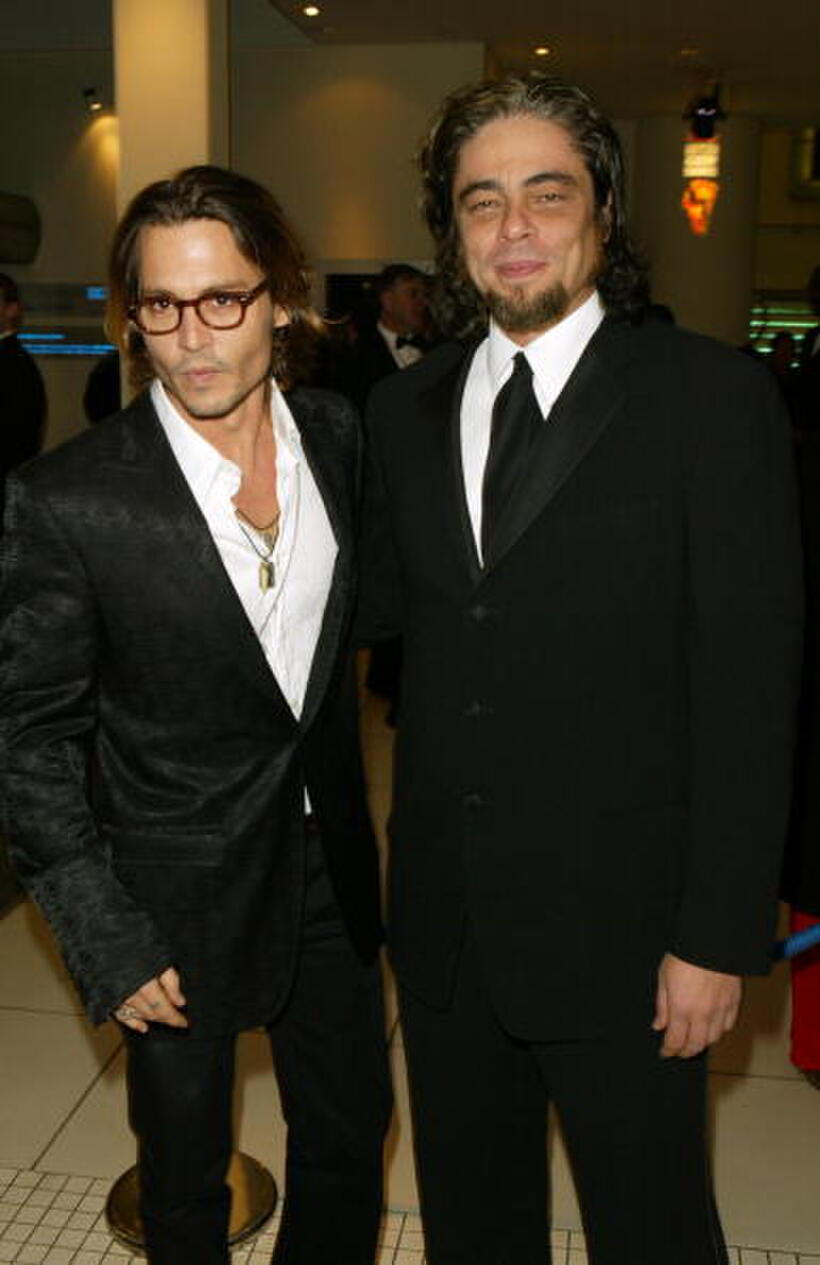 Actors Johnny Depp and Benicio Del Toro at the "The Orange British Academy Film Awards" in London.