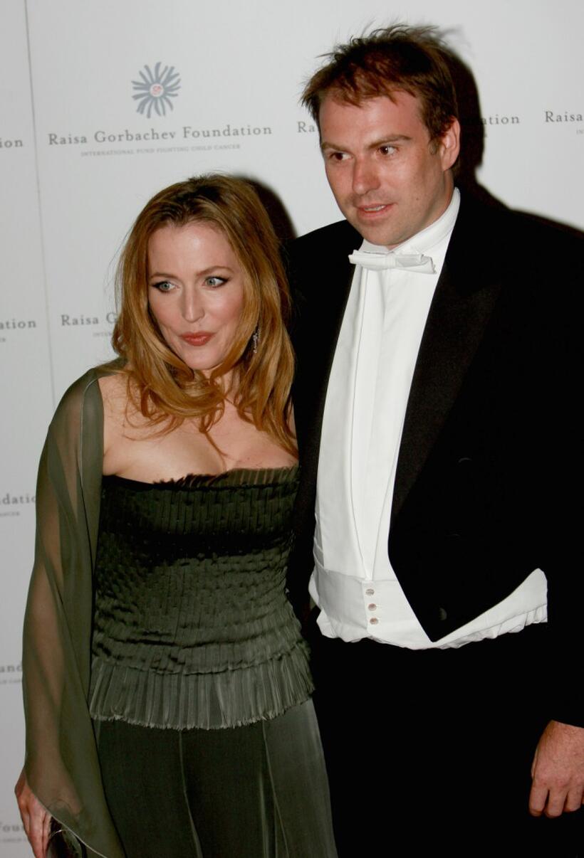 Gillian Anderson and Guest at the Raisa Gorbachev Foundations Second Annual Gala Dinner.