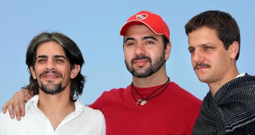 Pablo Echarri, Adrian Caetano and Rodrigo De la Serna at the photocall of "Cronica De Una Fuga" during the 59th International Cannes Film Festival.