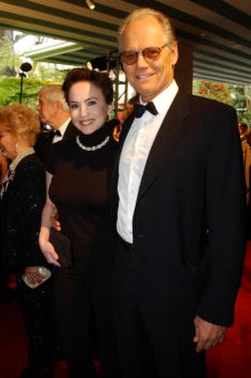 Fred Dryer and Guest at the Vanity Fair Oscar Party.