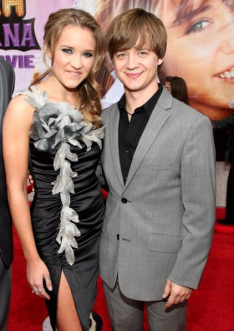 Emily Osment and Jason Earles at the premiere of "Hannah Montana: The Movie."