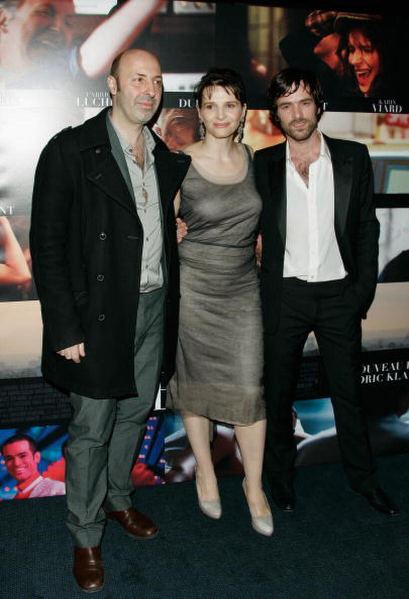 Director Cedric Klapisch, Juliette Binoche and Romain Duris at the premiere of "Paris."