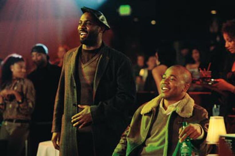 Idris Elba and Columbus Short in "This Christmas."