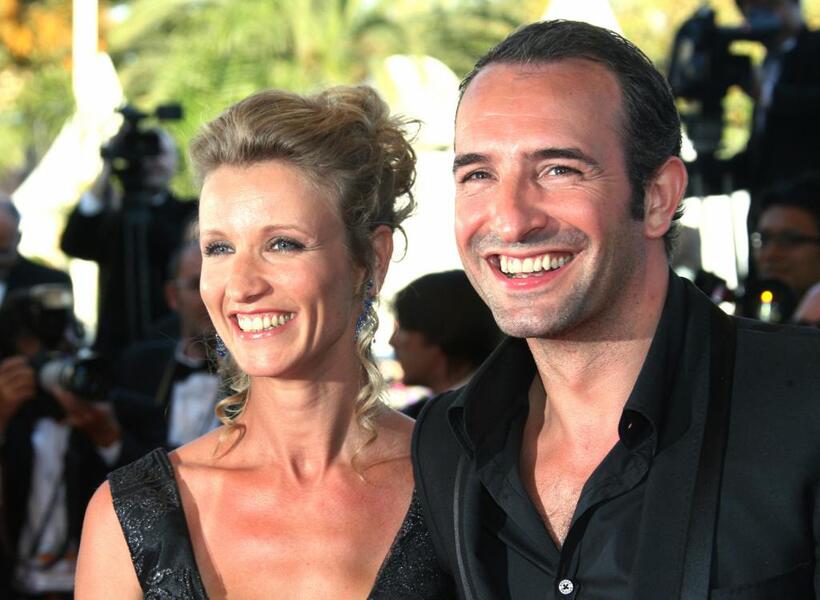 Alexandra Lamy and Jean Dujardin at the screening of "Les Chansons d'Amour" during the 60th edition of the Cannes Film Festival.