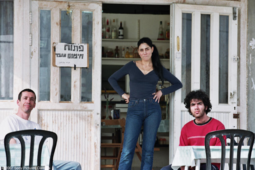 Rubi Moscovich as Itzik, Ronit Elkabetz as Dina, Shlomi Avraham as Papi in "The Band's Visit."