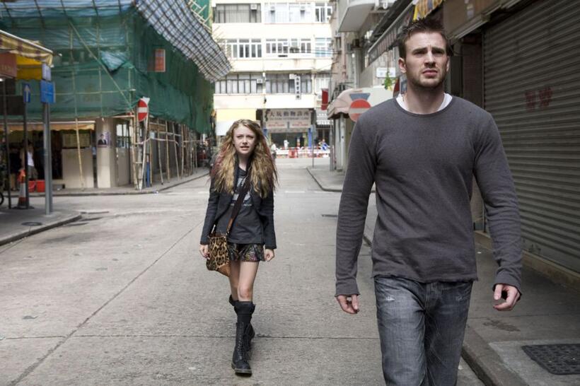 Chris Evans as Nick Gant and Dakota Fanning as Cassie Holmes in "Push."