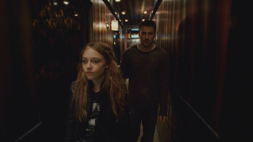 Dakota Fanning and Chris Evans in "Push."