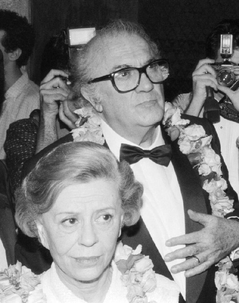 Federico Fellini and his wife Giulietta Masina at "Area", a club where a party was given for the director after a tribute at the Linclon Center in New York.