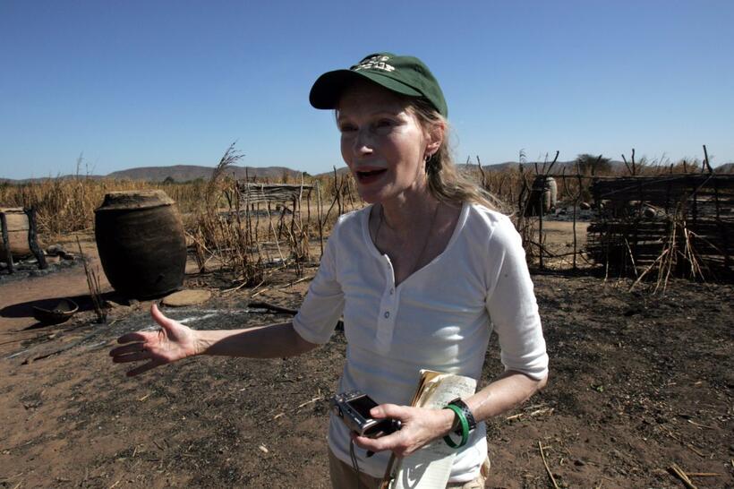 Mia Farrow at the burned village in Tamadjour.