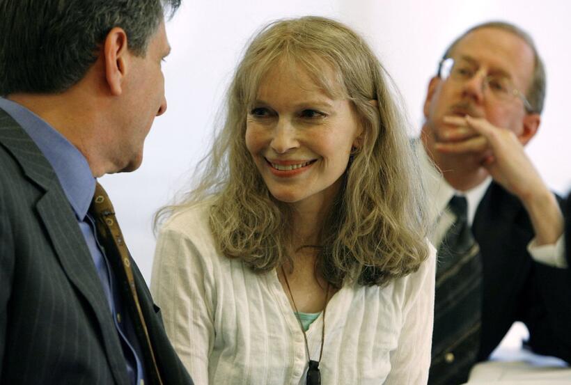 Mia Farrow, David Rubenstein and Lawrence Rossin at the National Press Club for news conference Save Darfur Coalition.