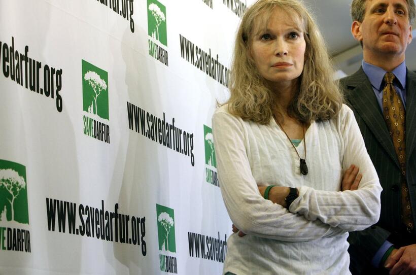 Mia Farrow and David Rubenstein at the National Press Club for news conference Save Darfur Coalition.