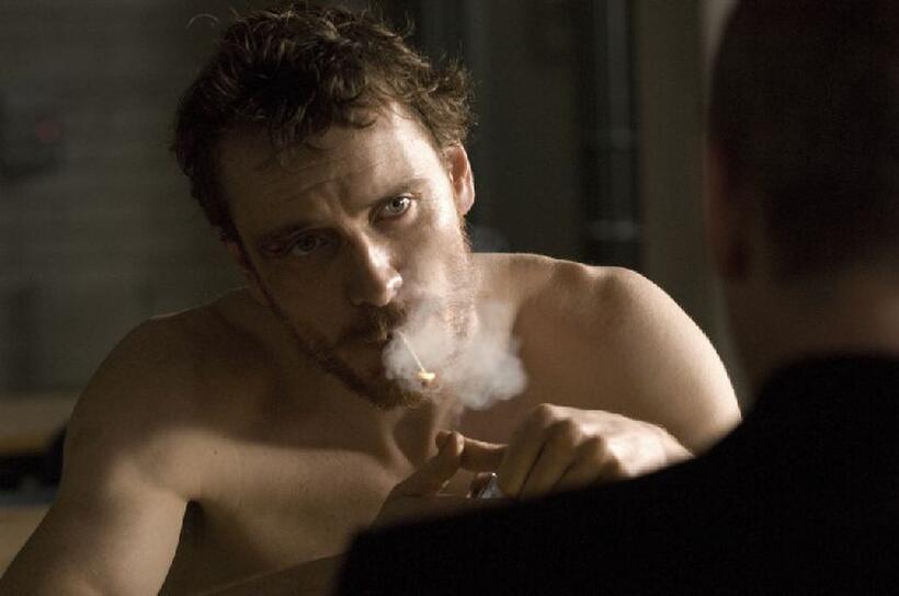Michael Fassbender as Bobby Sands and Liam Cunningham as Father Dominic Moran in "Hunger."