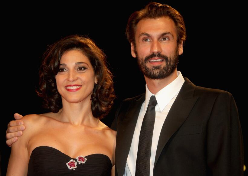 Donatella Finocchiaro and Fabrizio Gifuni at the premiere of "Il Dolce E L'Amaro" during the 64th Venice Film Festival.