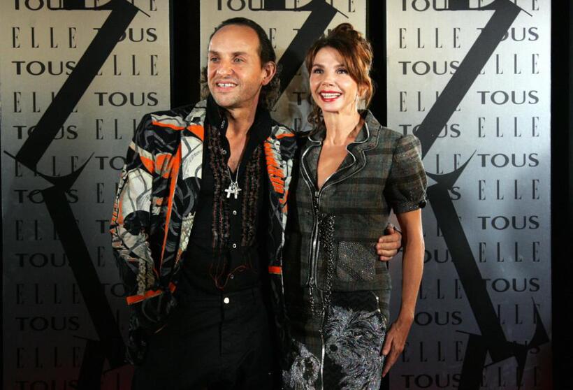 Victoria Abril and Custo Dalmau at ELLE Magazine XX Anniversary Party.