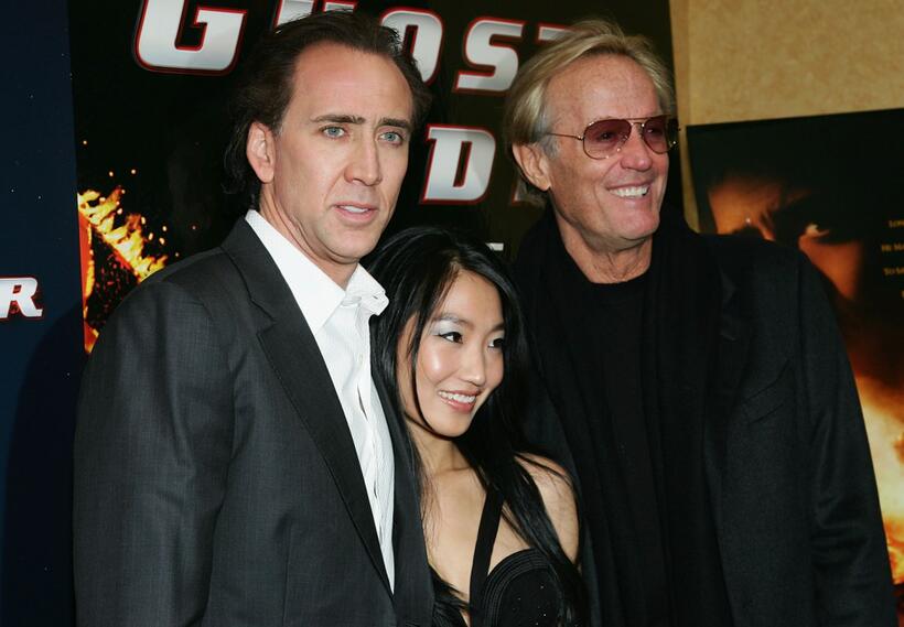 Peter Fonda, Nicolas Cage and his wife Alice Kim at the premiere of "Ghost Rider" at Regal E-Walk Stadium.