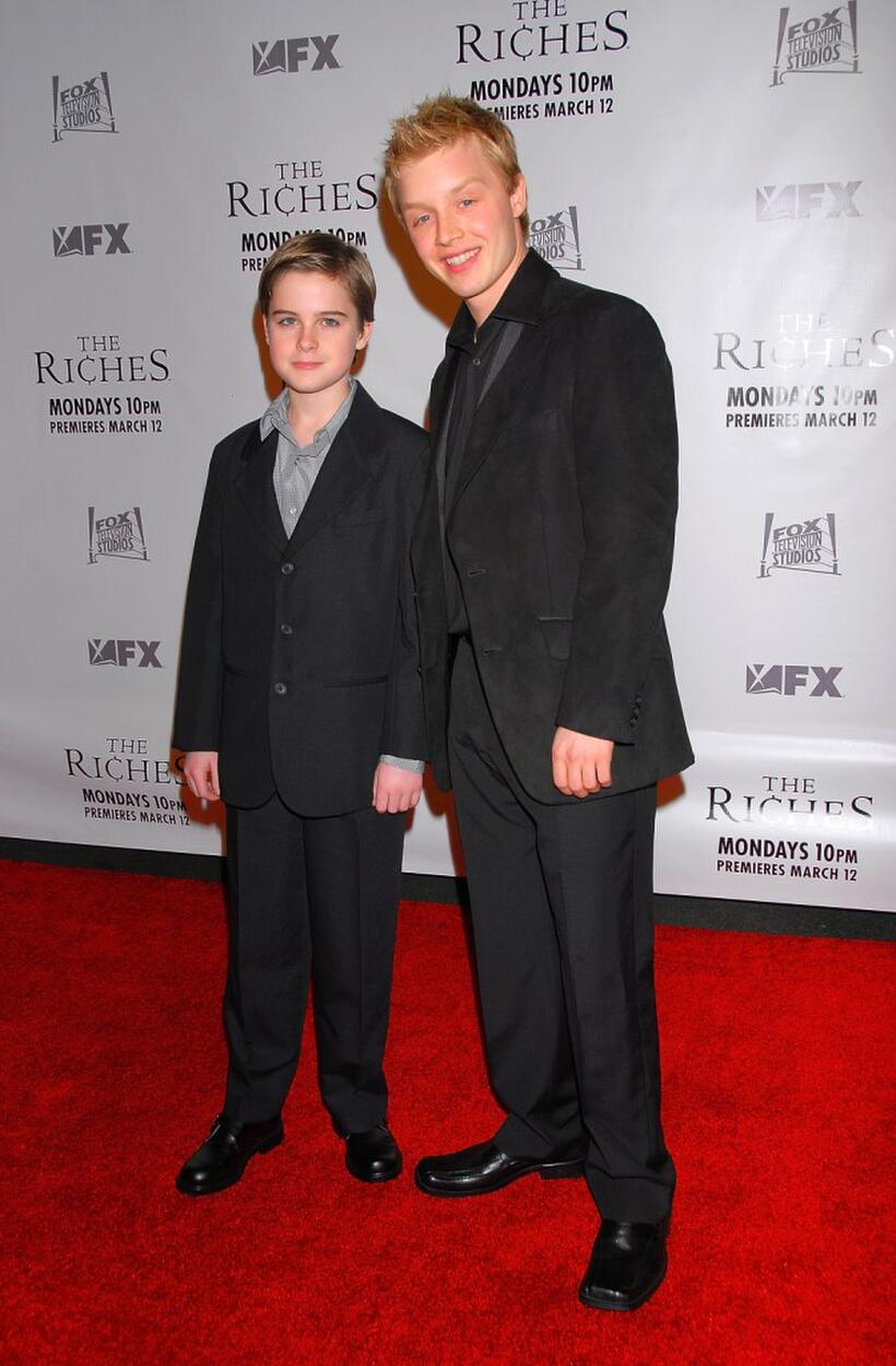 Aidan Mitchell and Noel Fisher at the premiere of "The Riches."