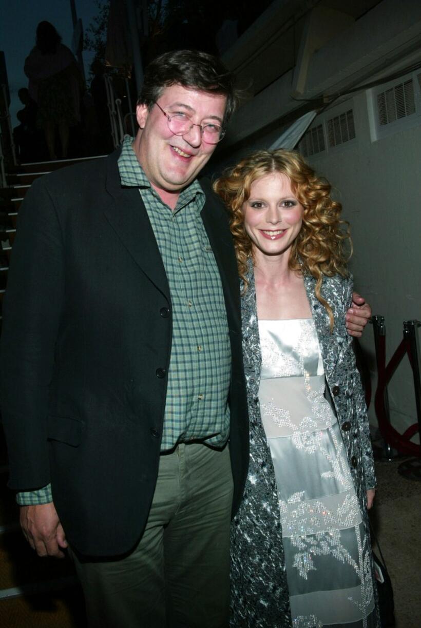 Stephen Fry and Emilia Fox at party on Martinez Beach during 56th International Cannes Film Festival 2003.