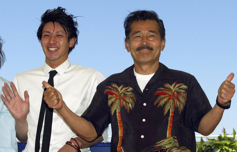 Joe Odagiri and Tatsuya Fuji at the photocall of "Akarui Mirai" during 56th the International Cannes Film Festival 2003.
