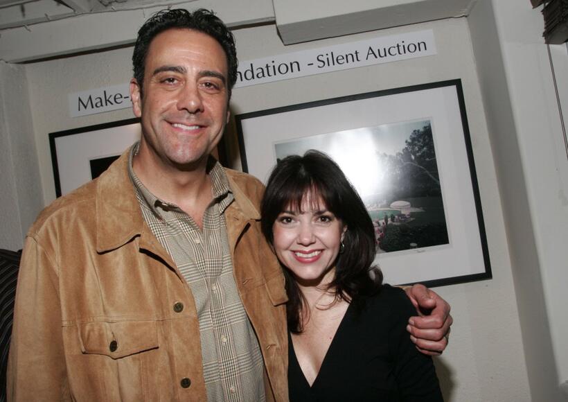 Brad Garrett and Kelli Seely at a gallery exhibition of photographer Slim Aarons.
