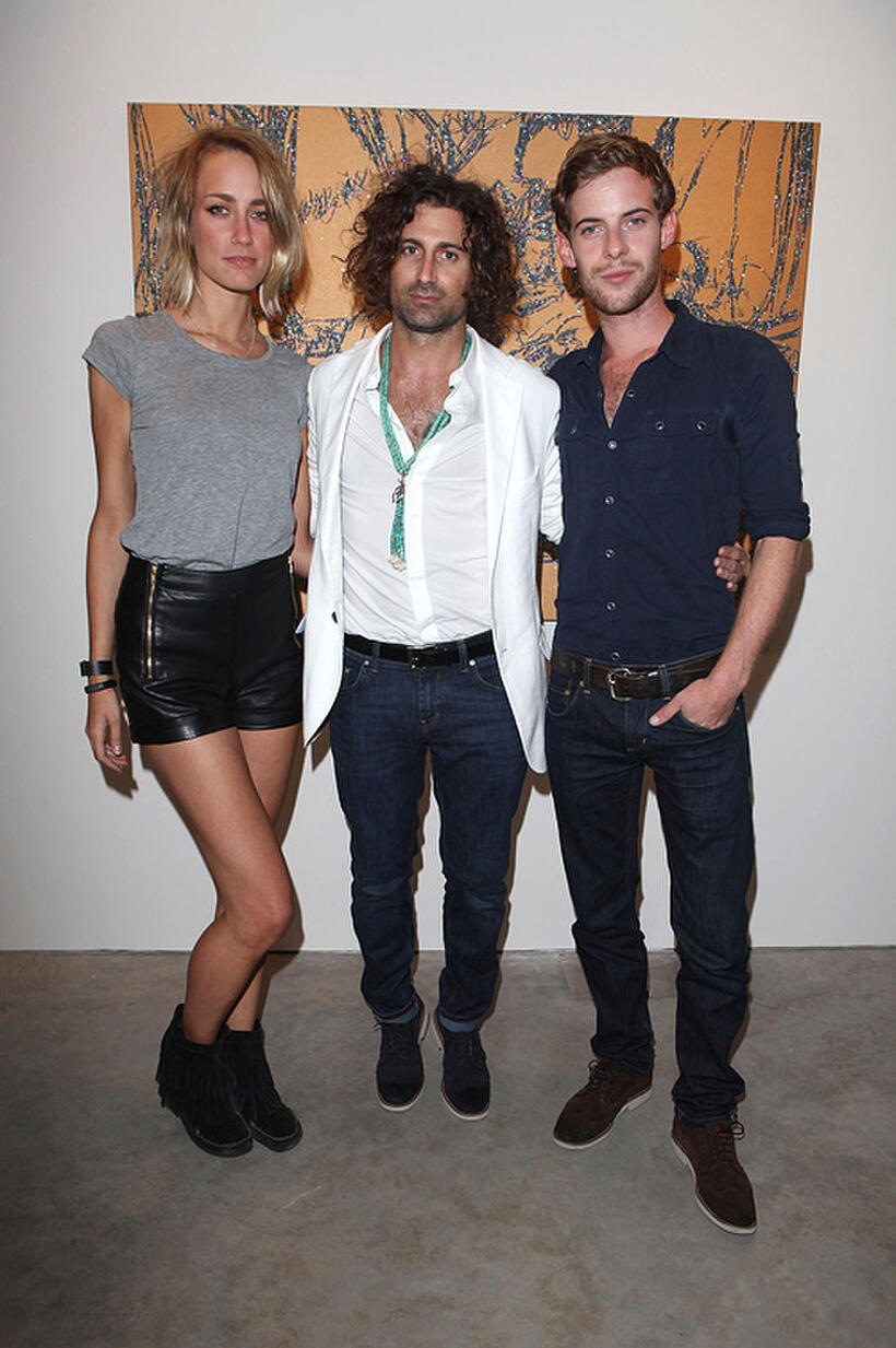 Ruta Gedmintas, artist Todd DiCiurcio and Luke Treadaway at the Todd DiCiurcio "Gold" Exhibition in London.