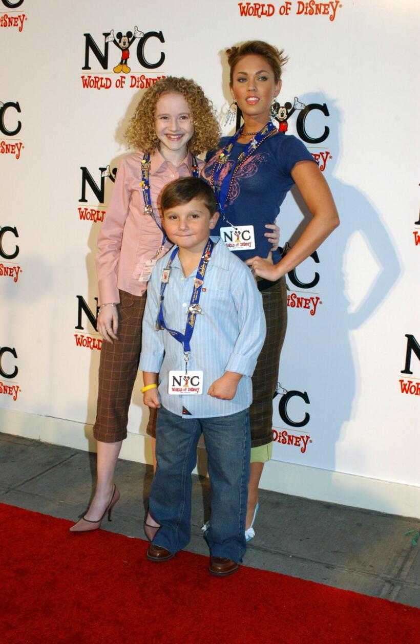 Macey Cruthird, Megan Fox and Paulie Litt at the grand opening of the World Disney Flagship Store.