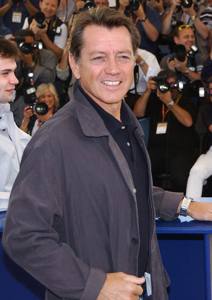 Bernard Giraudeau at the photocall of "La Petite Lili" during the 56th Cannes Film Festival.