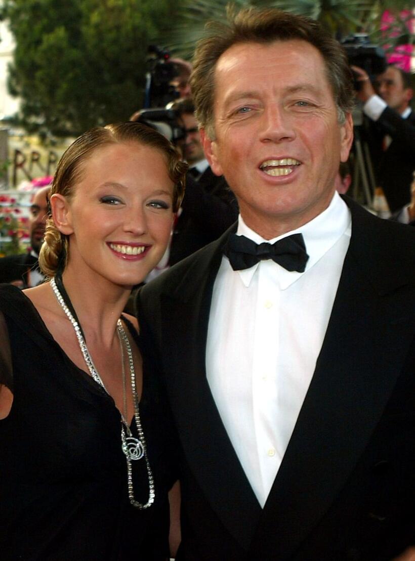 Bernard Giraudeau and Ludivine Sagnier at the Palais des festivals to attend the screening of "La Petite Lili" during the 56th Cannes film festival.