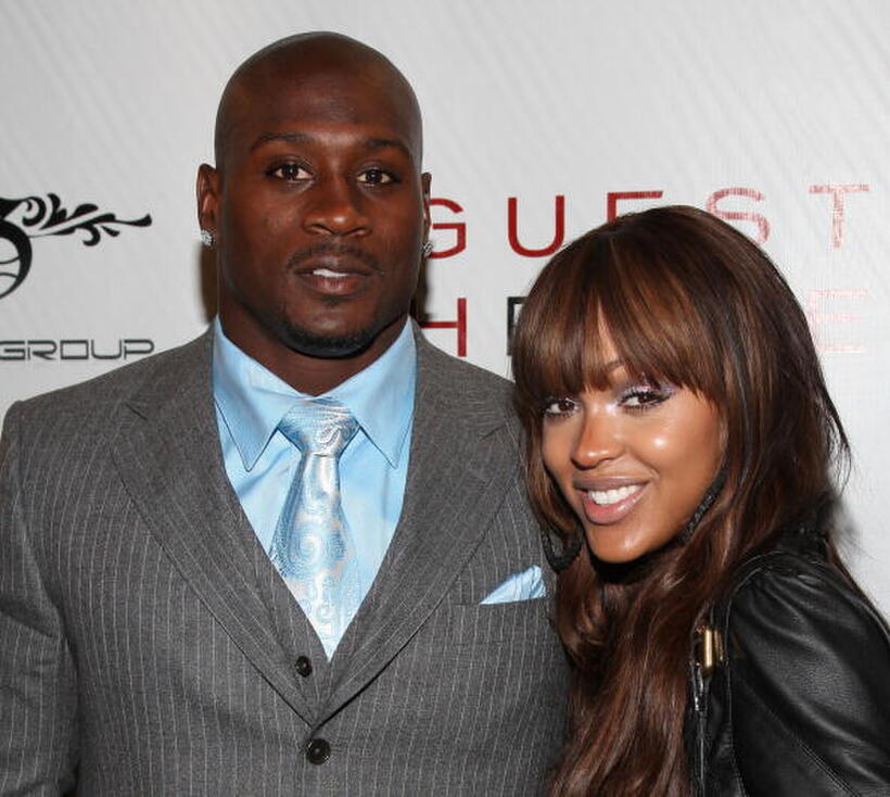 Football player Thomas Jones and Meagan Good at the Thomas Jones' birthday party.