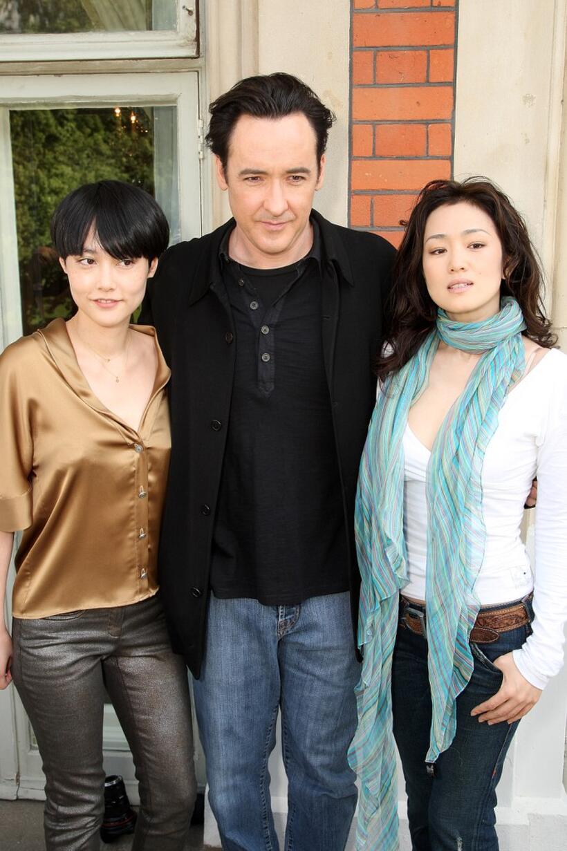 Rinko Kikuchi, John Cusack and Gong Li at the photocall of "Shanghai."