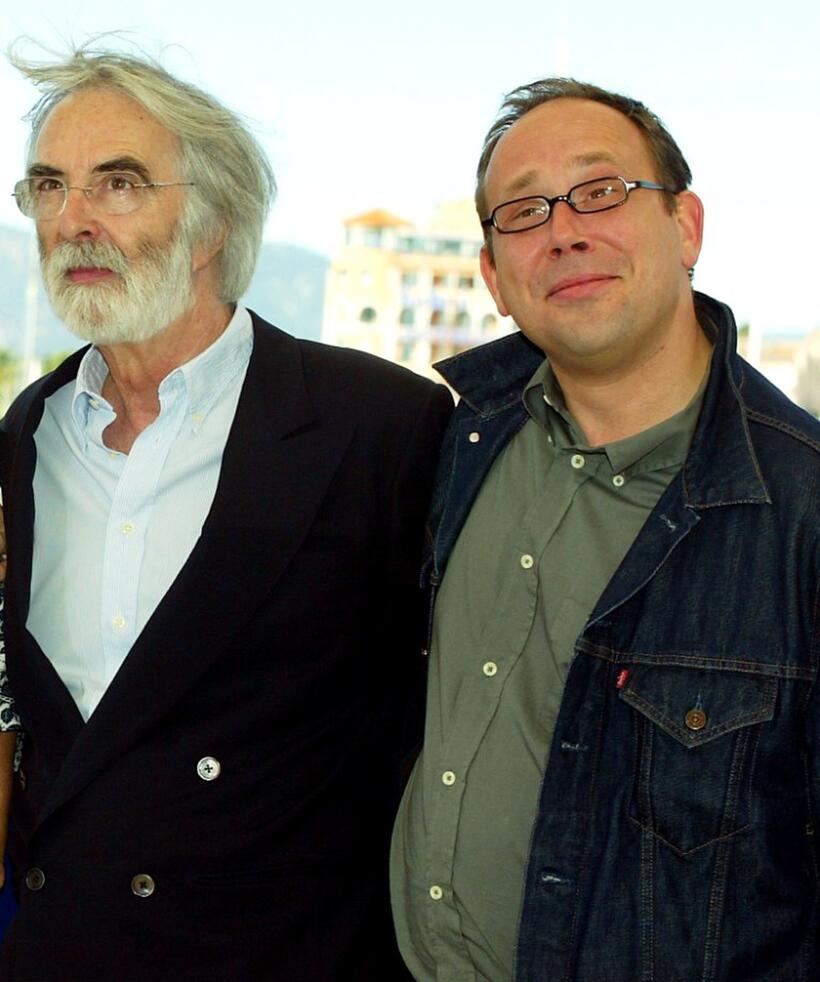 Director Michael Haneke and Olivier Gourmet at the photocall of "Le Temps du loup" during the 56th International Cannes Film Festival.