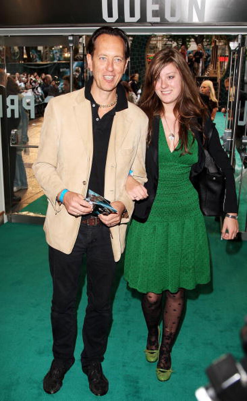 Richard E. Grant and his guest at the european premiere of "Harry Potter And The Order of The Phoenix" at Odeon Leicester Square.