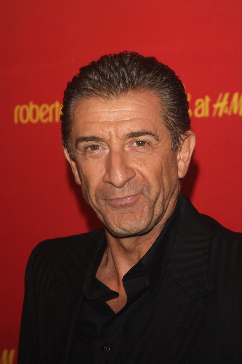 Ezio Greggio at the Roberto Cavalli at H&M collection launch party.