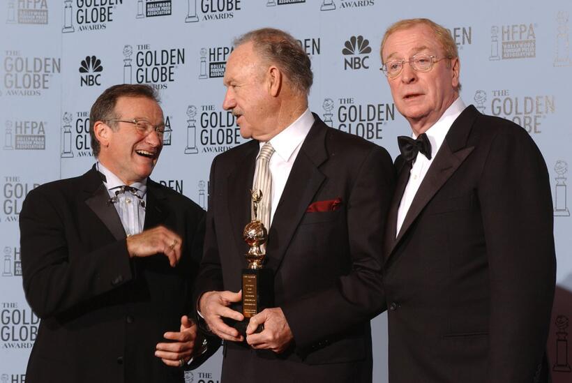 Gene Hackman, Robin Williams and Michael Caine at the 60th Annual Golden Globe Awards.