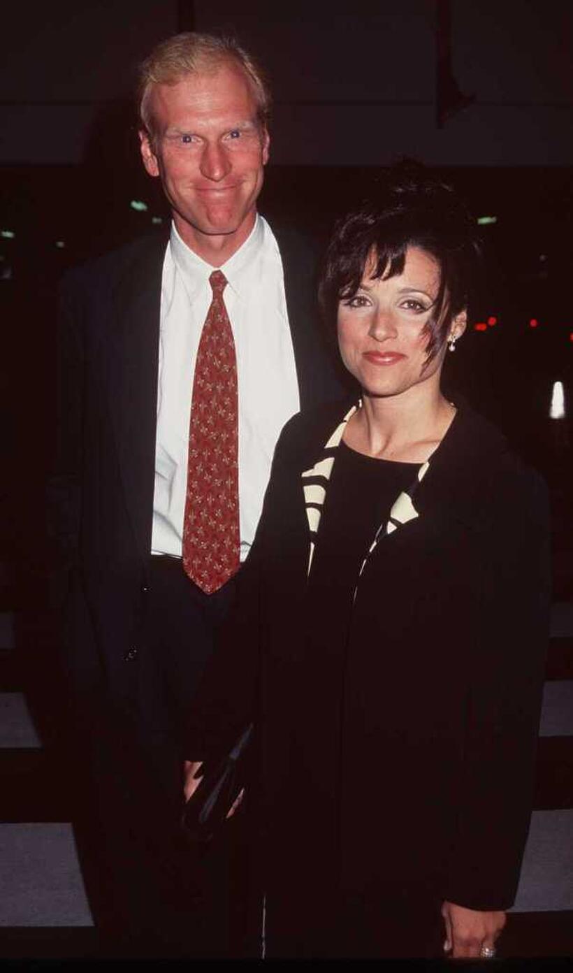 Brad Hall and Julia Louis-Dreyfuss at the Peterson's Auto Museum to benefit "Heal the Bay."